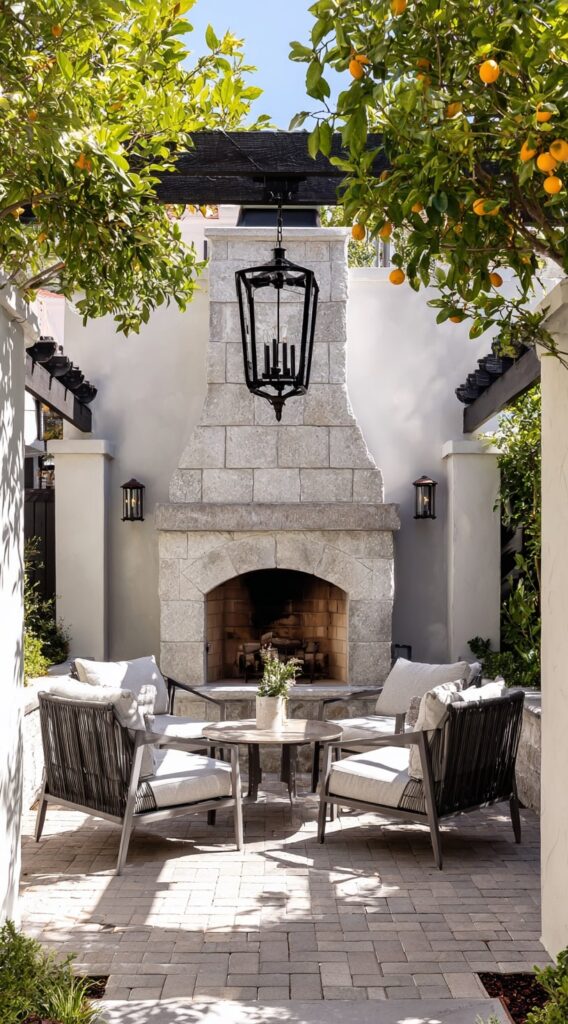 Chic Courtyard Fireplace with Citrus Charm
